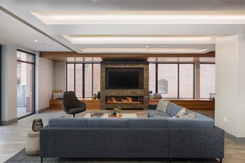 Resident club lounge with cozy fireplace